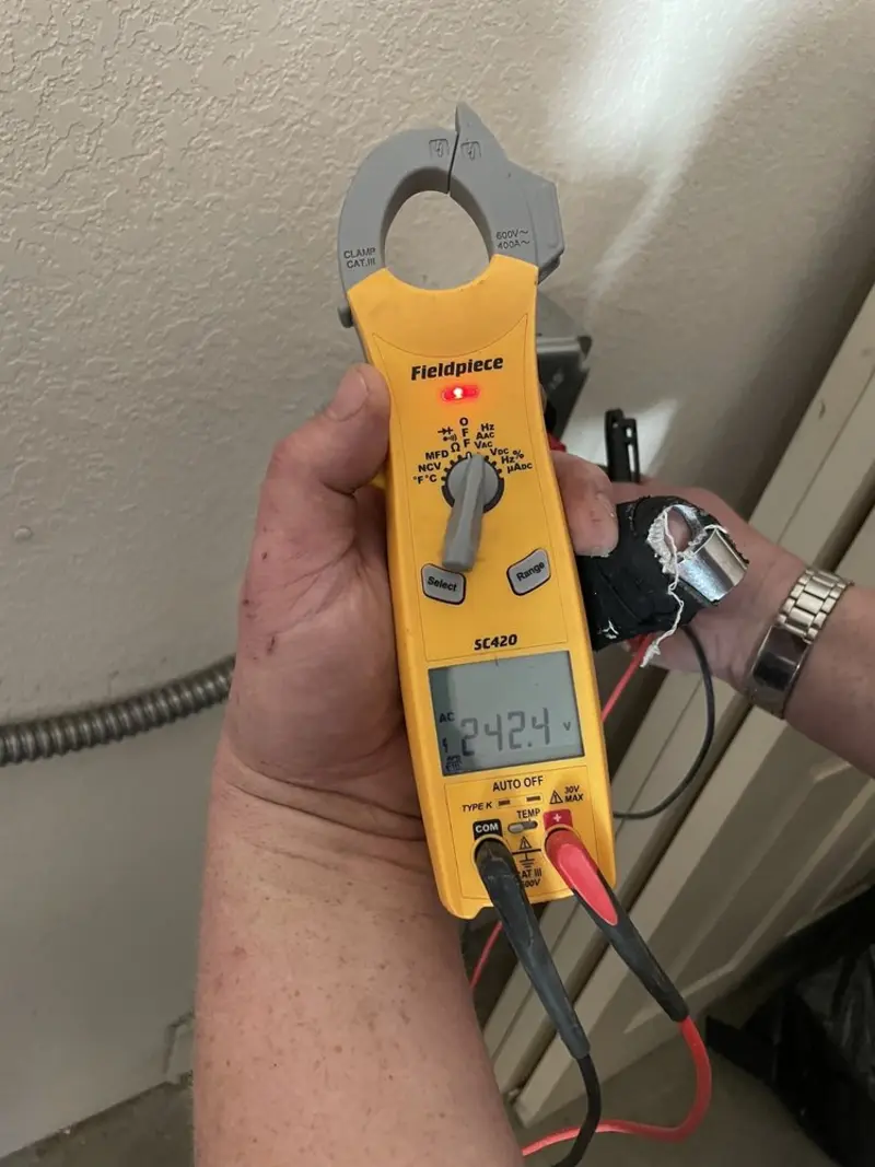 Voltage testing with clamp meter during Hot Tub / Pool Electrical Wiring in Cave Spring